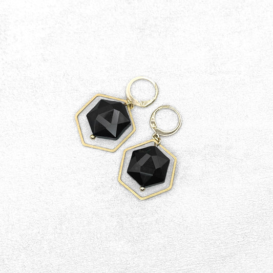 Black beads with gold charms. Handmade hexagon geometric earrings.
