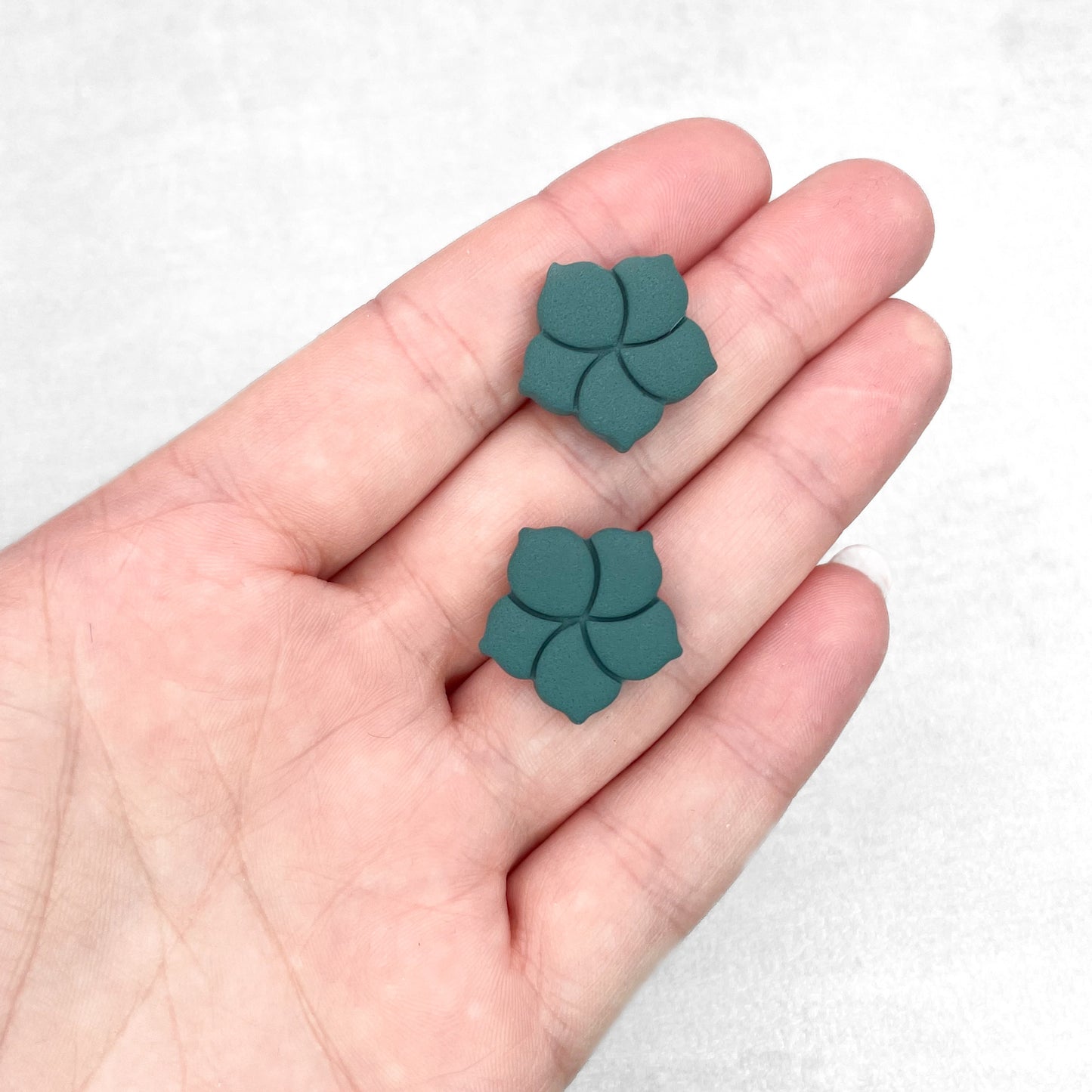 Dark teal flower stud earrings. Handmade polymer clay stud earrings.