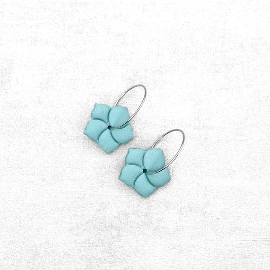 Pastel blue floral earrings. Handmade polymer clay earrings.