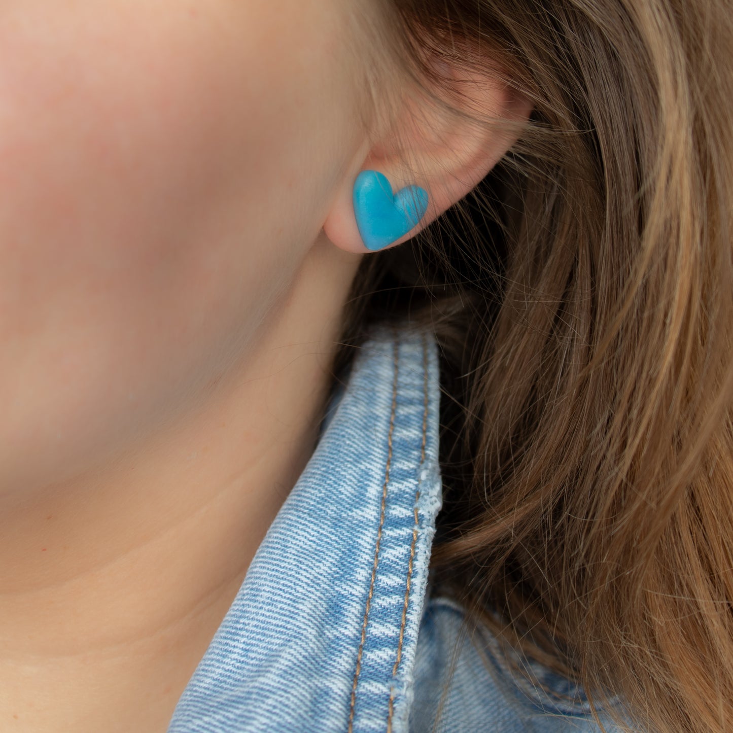 Sky blue heart stud earrings. Handmade polymer clay stud earrings.