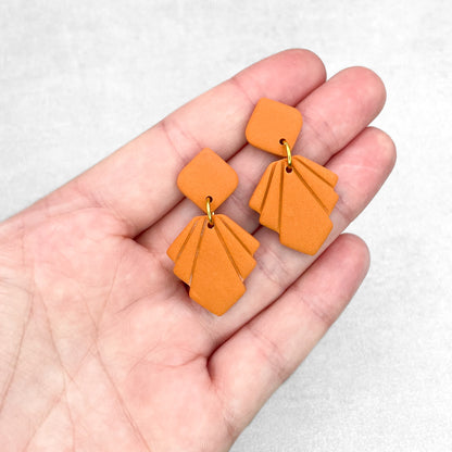 Orange geometric earrings. Handmade polymer clay earrings.