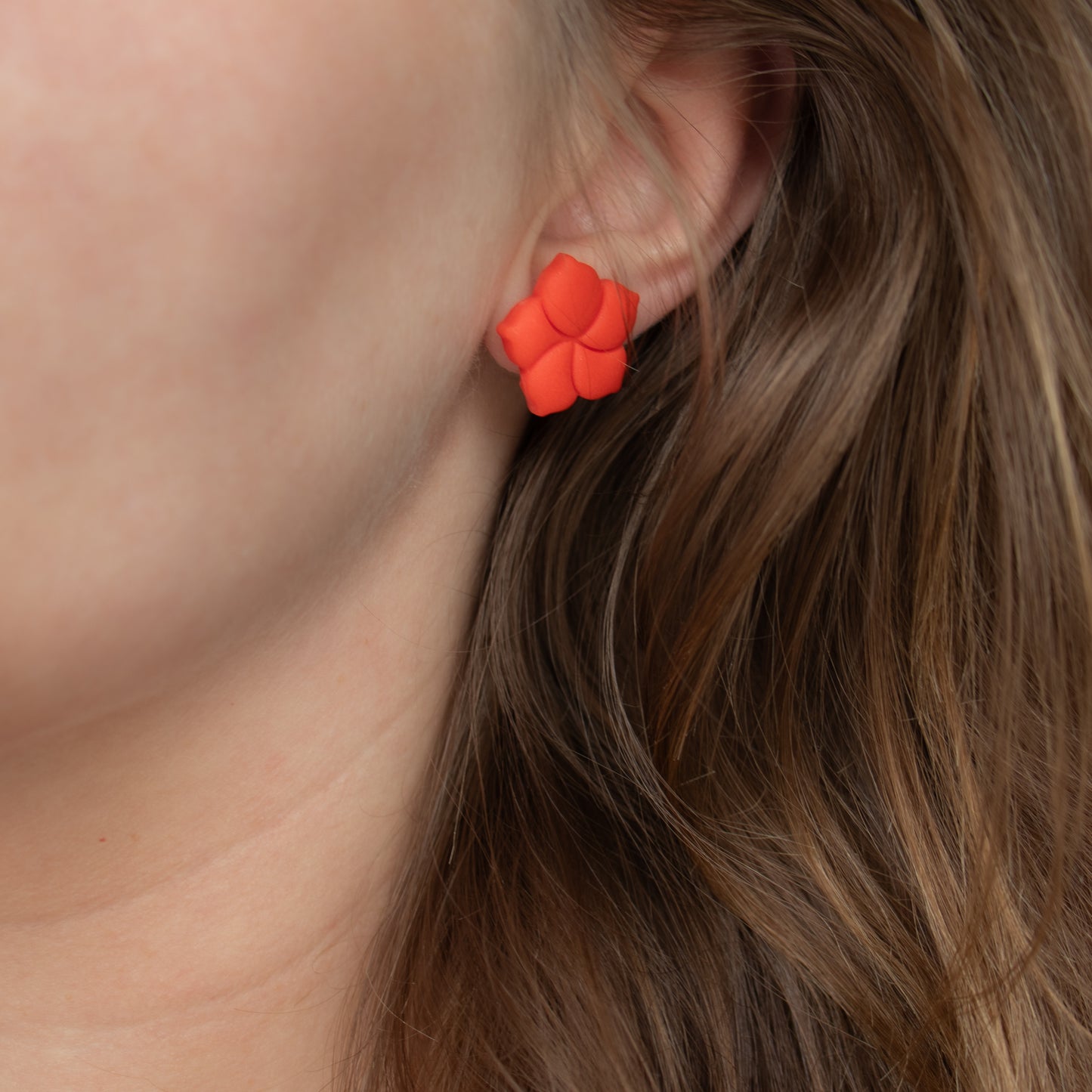 Orange red flower stud earrings. Handmade polymer clay stud earrings.